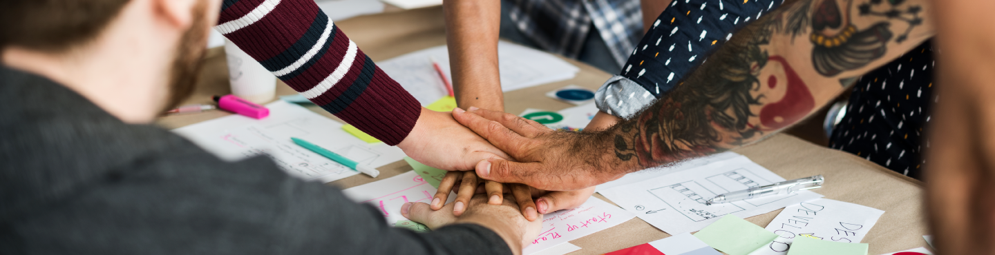 colleague meeting hand pile 2026 01 07 23 21 40 utc